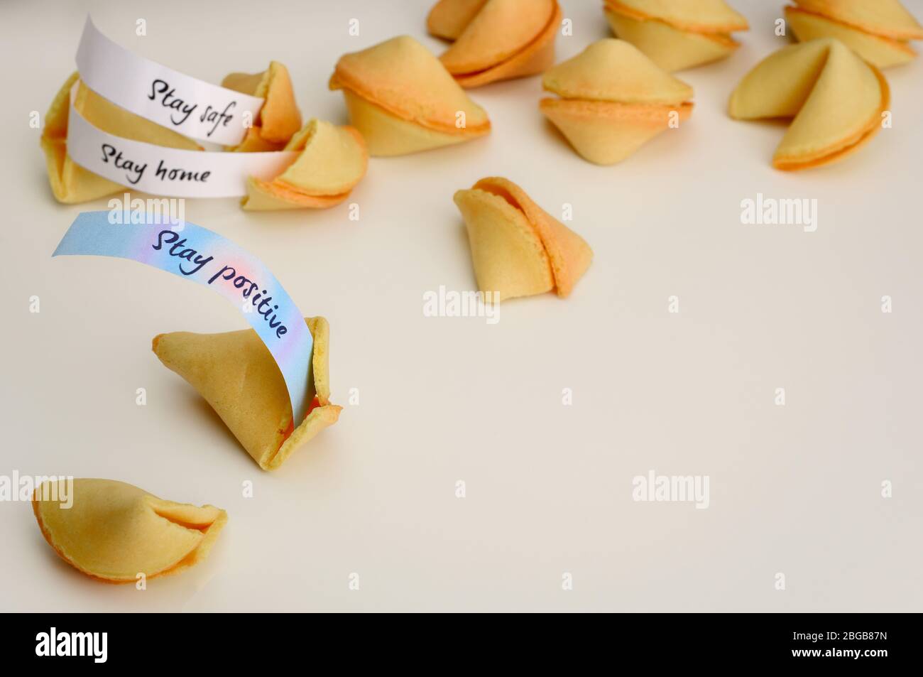Chinese fortune cookies. An open cookie with a wish Stay Positive. А