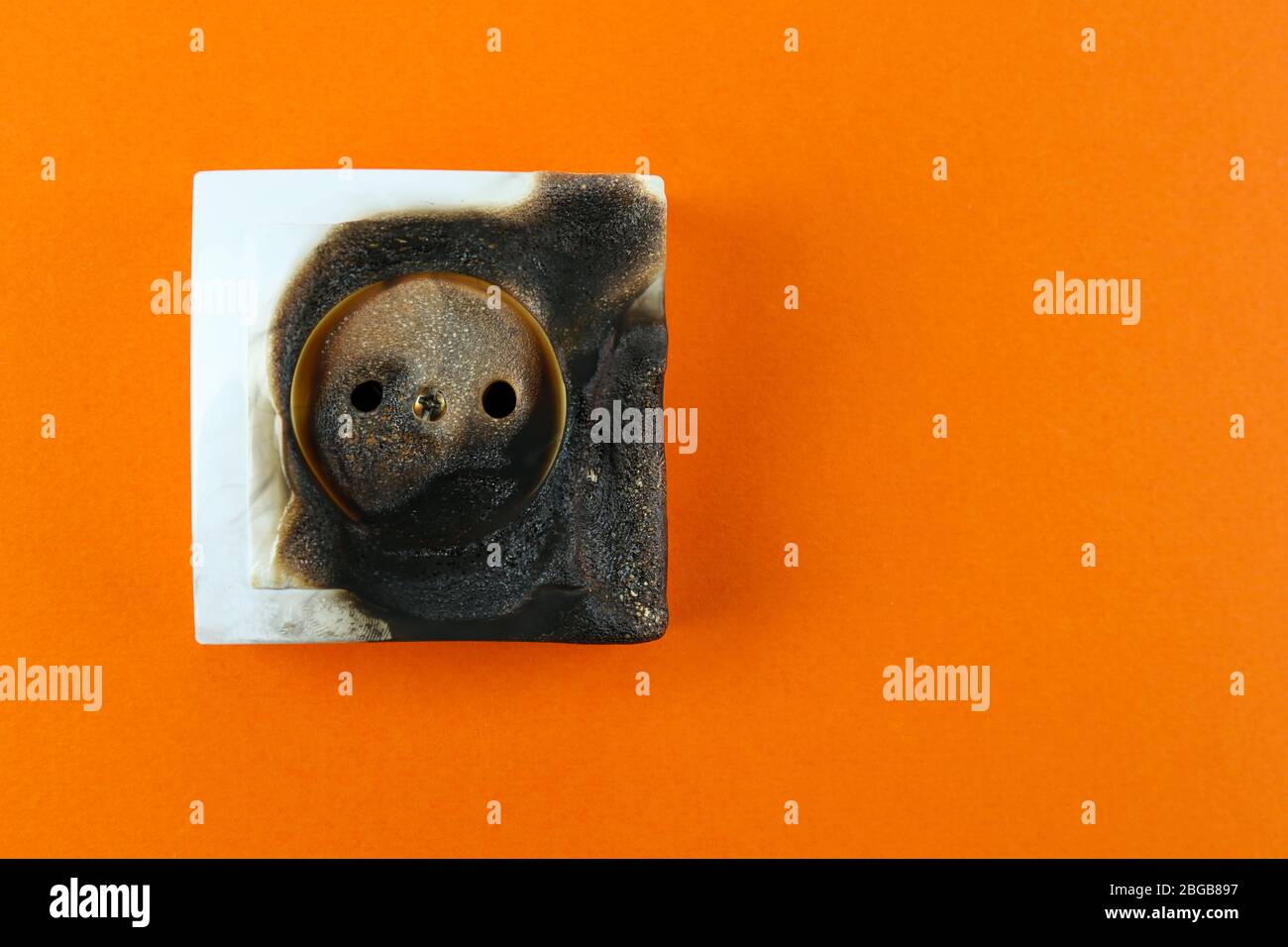 Burned plug socket close up Stock Photo Alamy