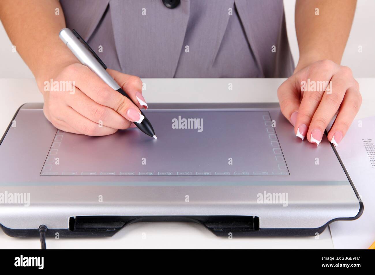 Sketching woman using graphics hi-res stock photography and images - Alamy