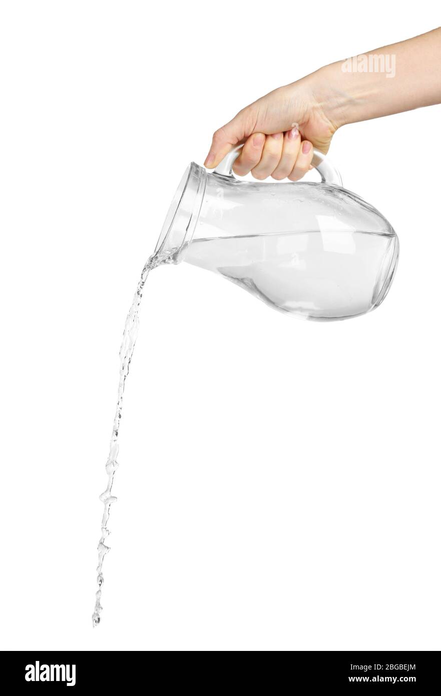 Pouring water from glass pitcher, isolated on white Stock Photo by  ©belchonock 46493351