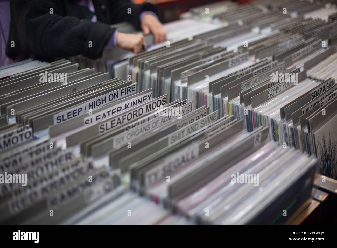 Vienna, Austria October 2019 Woman searching through vinyl records at