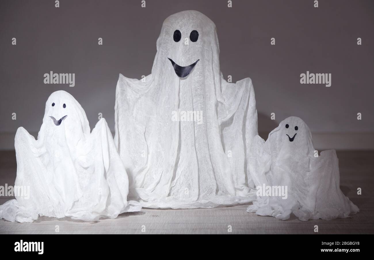 Halloween ghosts, on dark background Stock Photo
