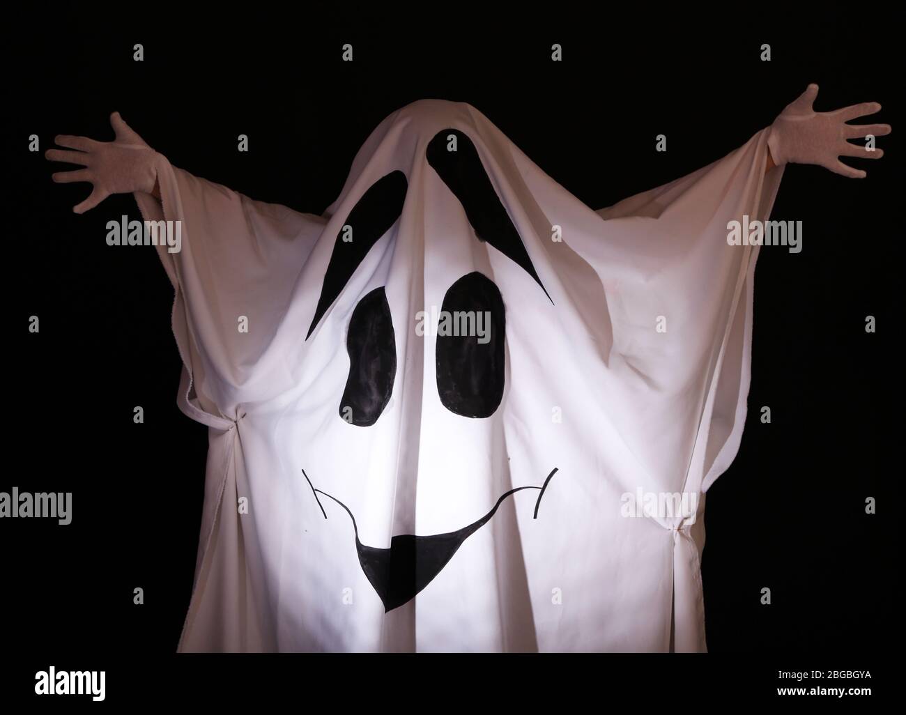 Halloween ghost, on dark background Stock Photo