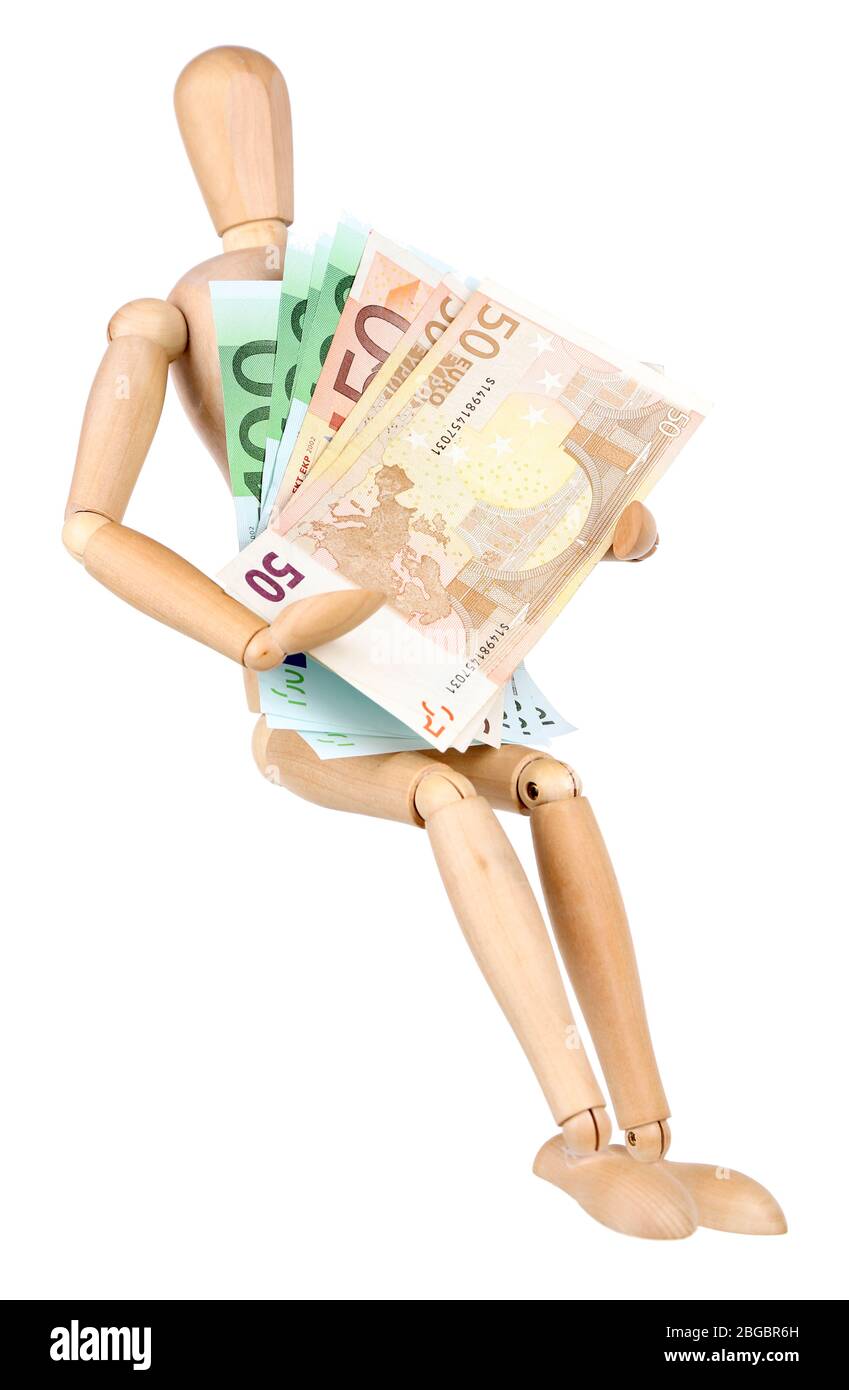 Wooden small mannequin with money isolated on white Stock Photo Alamy