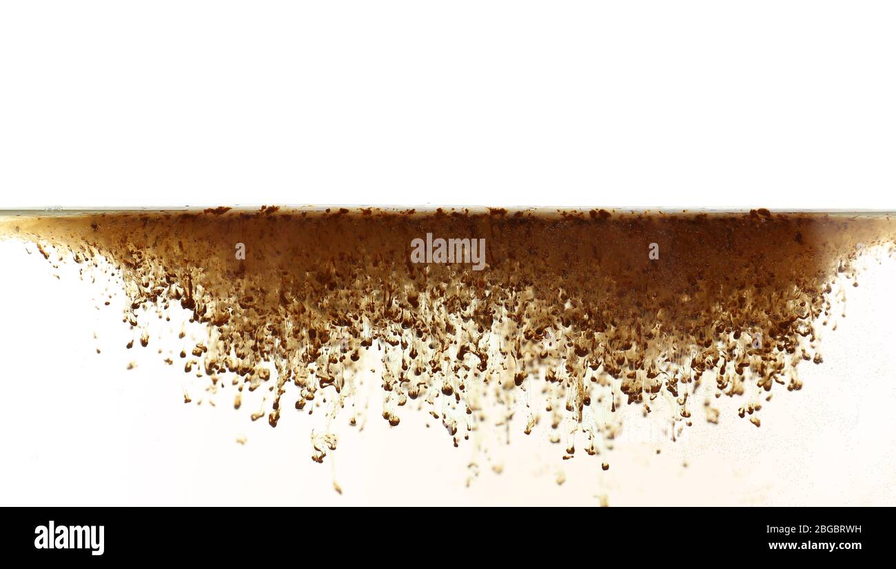 Instant coffee in hot water Stock Photo Alamy