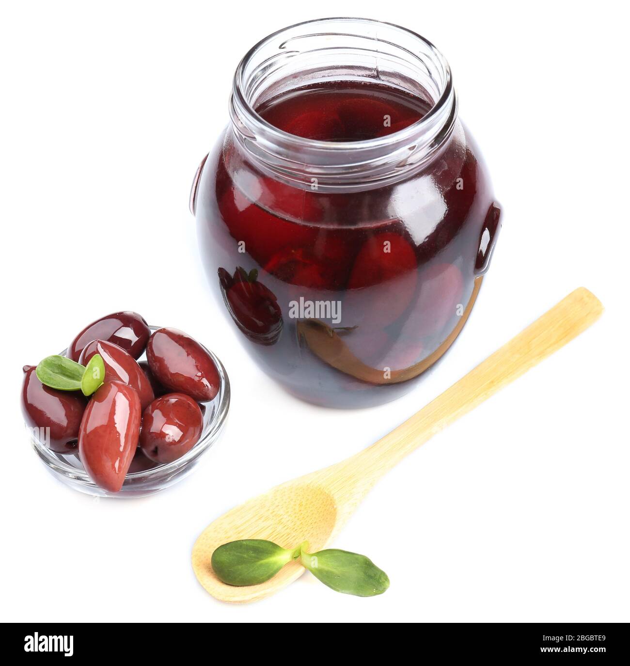 Black olives in glass jar, isolated on white Stock Photo Alamy