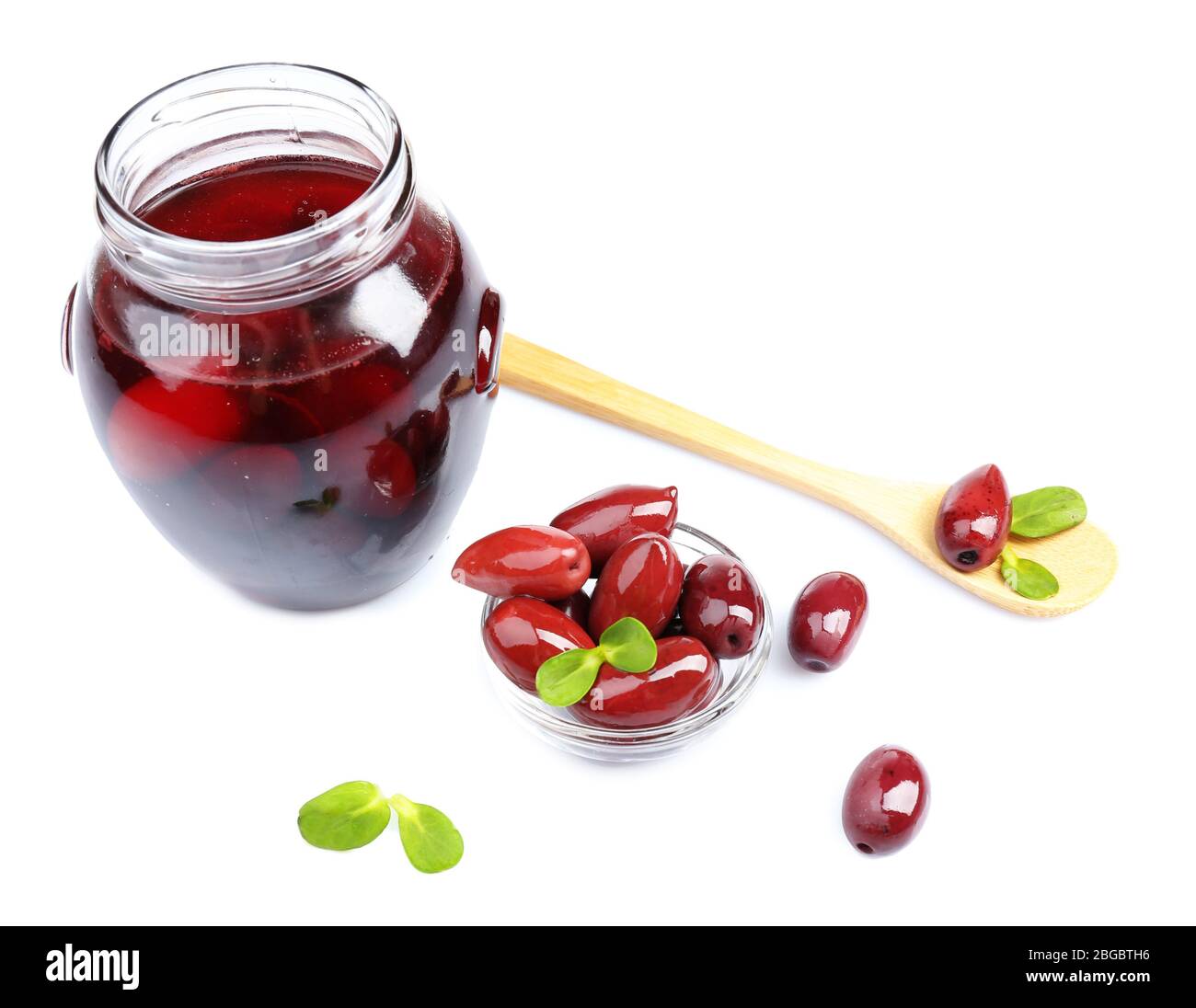 Black olives in glass jar, isolated on white Stock Photo Alamy