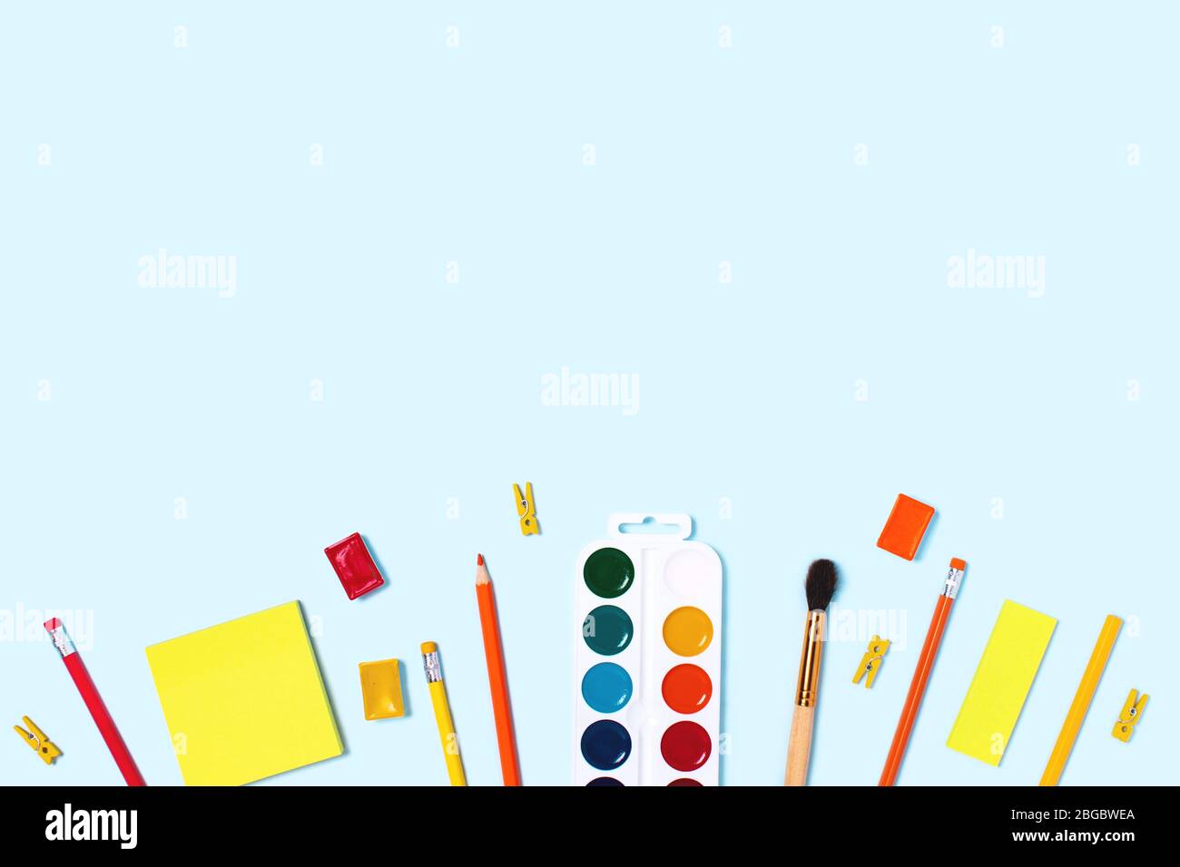 School supplies on blue background. Back to school flat lay picture ...