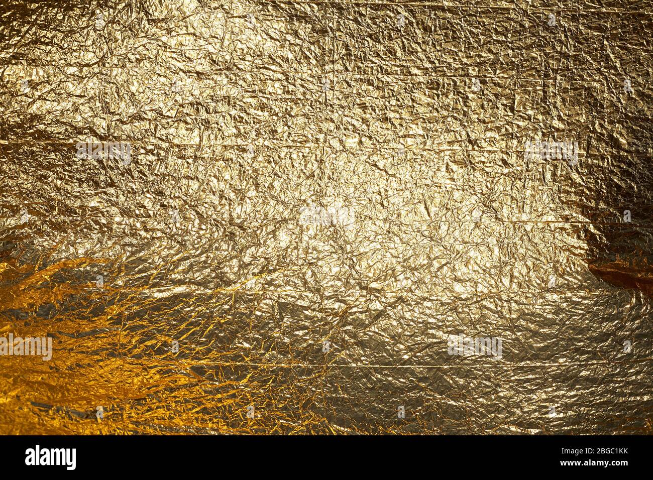 Texture of a thin crumpled sheet of foil. Crumpled foil background. Stock  photo foil. Gold chrome color Stock Photo - Alamy