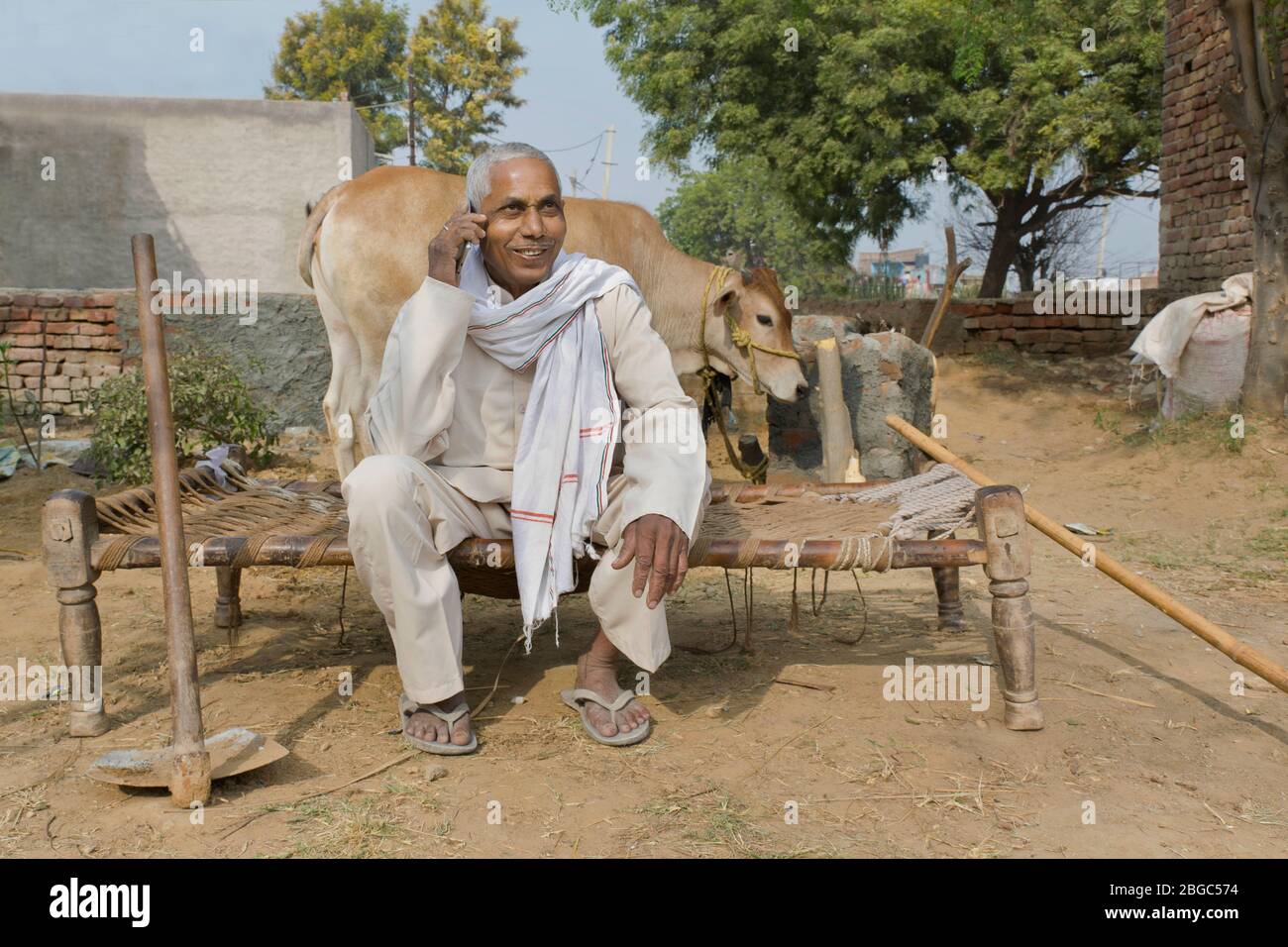 farmer talking on phone Stock Photo
