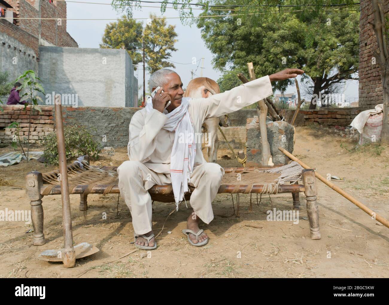 farmer talking on phone Stock Photo