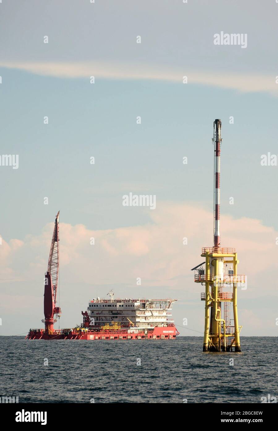 accommodation work boat or AWB anchorage at oil field for oil platform maintenance Stock Photo