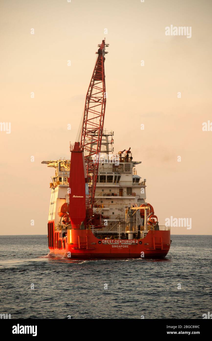 accommodation work boat stand by at oil field for offshore worker stay when working at oil platform Stock Photo