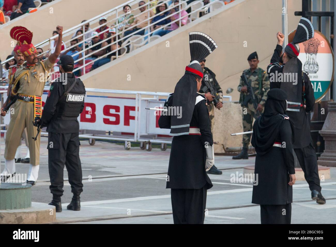 Wagah Border Ceremony on the border between Pakistan and India. Soldiers from both countries engage in a 30 minute military display. Stock Photo