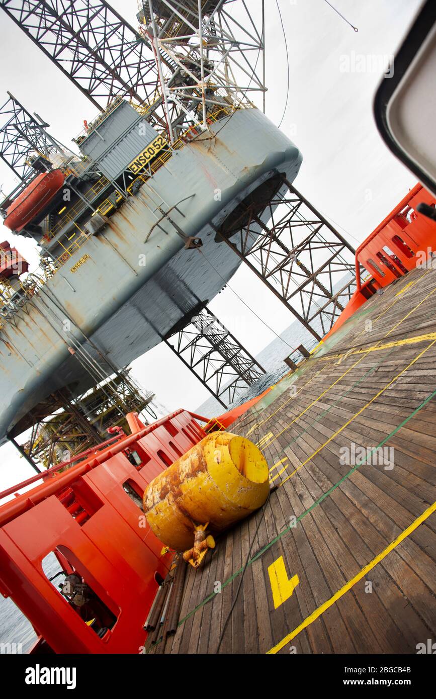 four point anchor handling operation  carried out on deck vessel for oil rig at sea Stock Photo