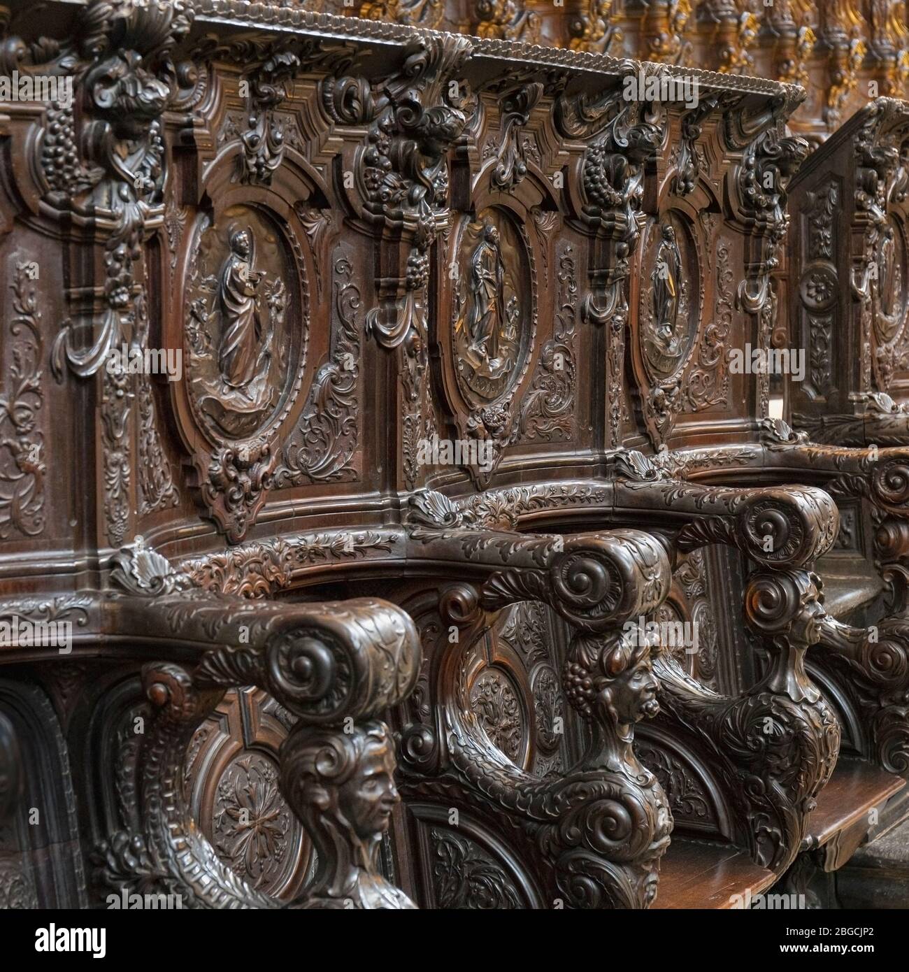 La Mezquita.  The Mosque.  Interior.  The 18th century carved wood choir stalls in the cathedral rear of the mosque.  They are the work of  Spanish sc Stock Photo