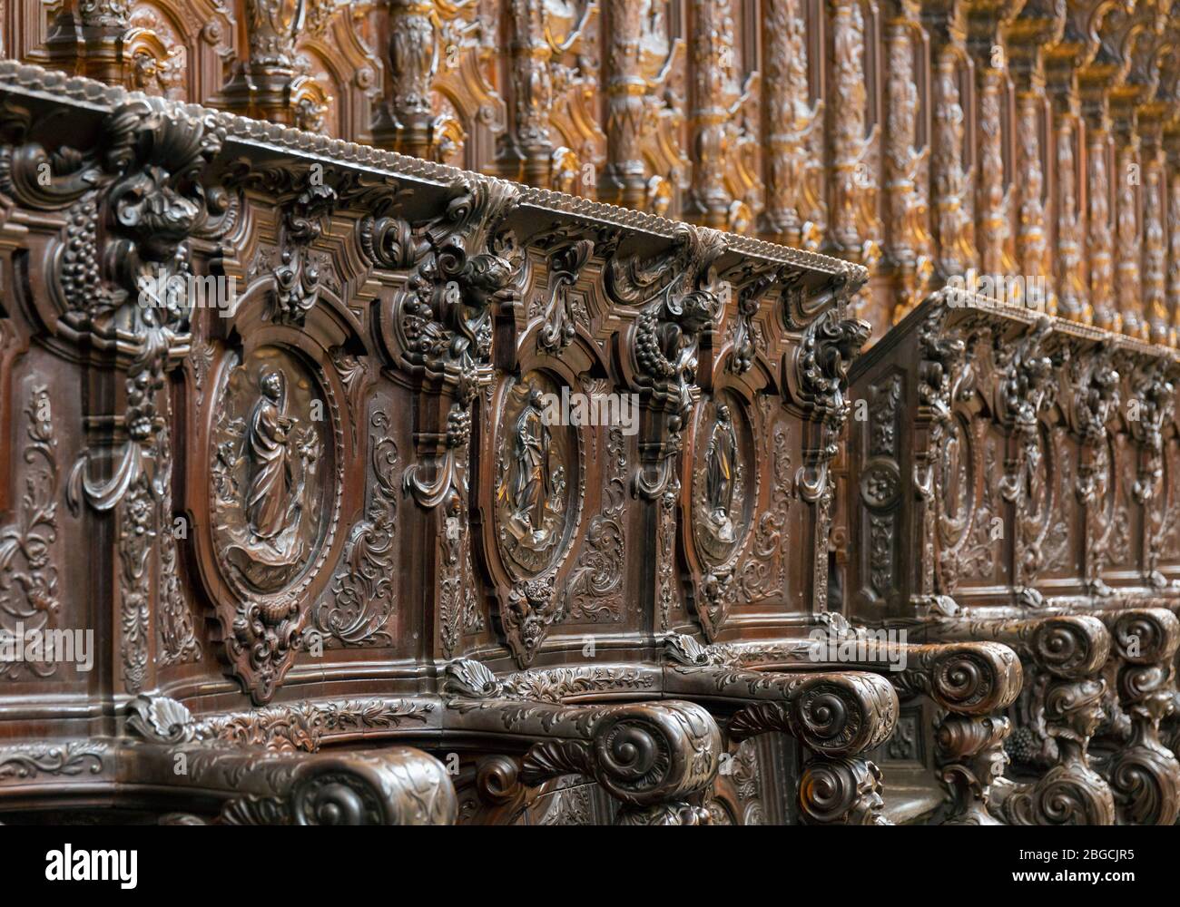La Mezquita.  The Mosque.  Interior.  The 18th century carved wood choir stalls in the cathedral rear of the mosque.  They are the work of  Spanish sc Stock Photo