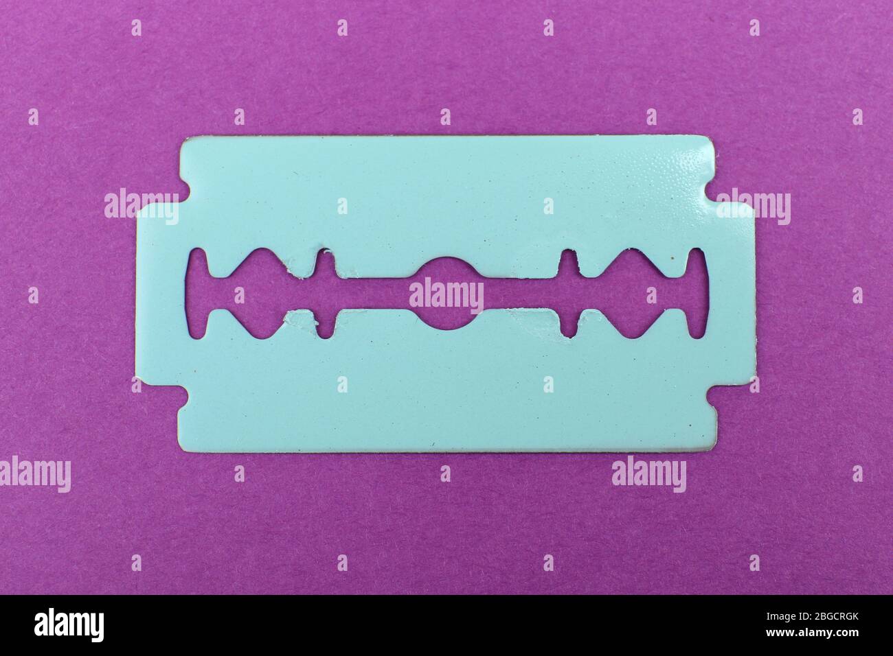 Razor blade on color background Stock Photo Alamy