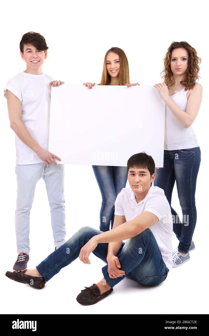 Group of happy young people holding blank poster isolated on white ...