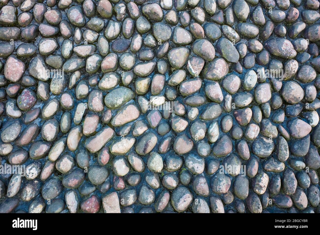 wall pattern of gravel stone and pebbles UK Stock Photo - Alamy