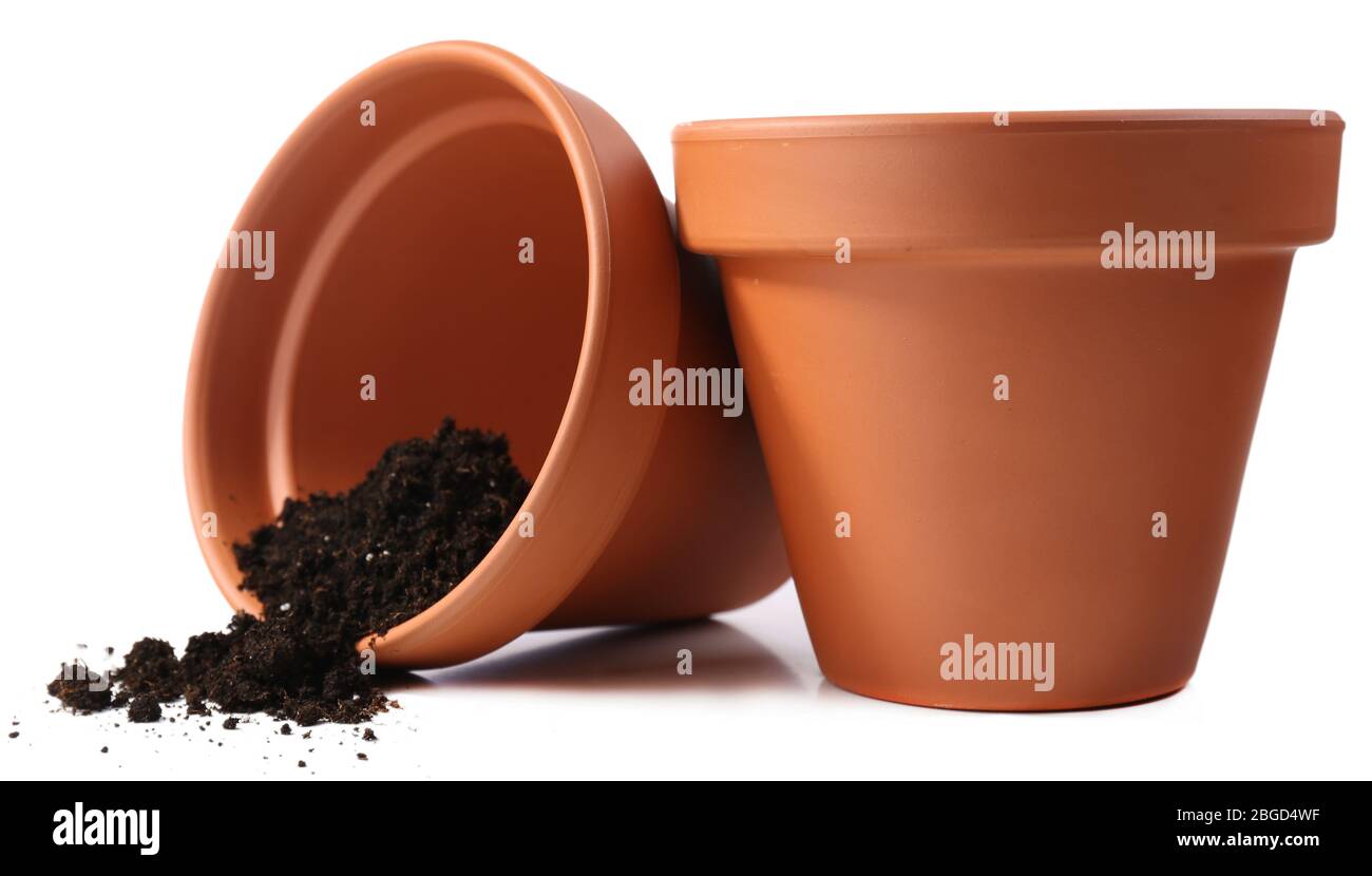 Clay flower pots and soil, isolated on white Stock Photo Alamy