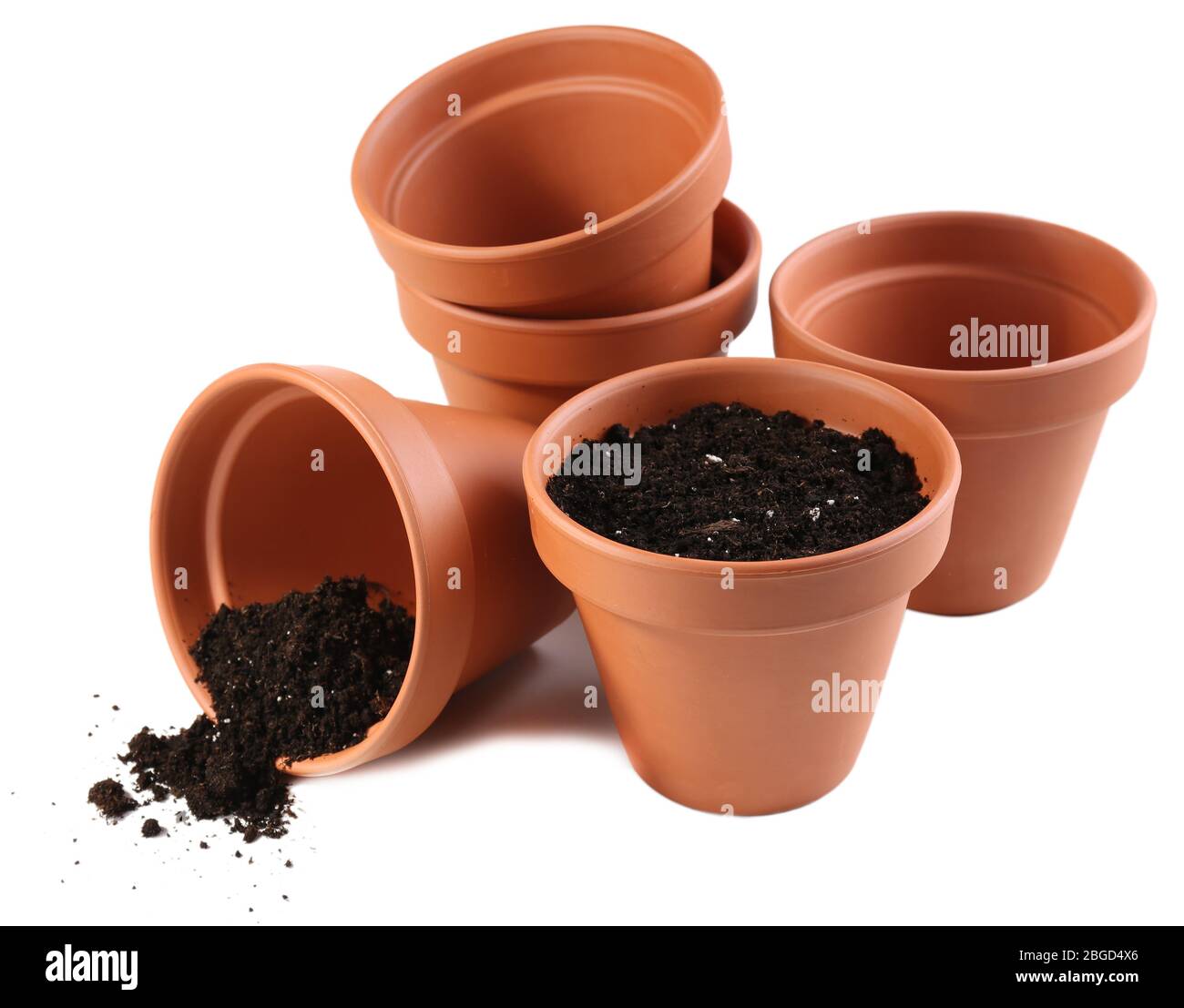Clay flower pots and soil, isolated on white Stock Photo - Alamy