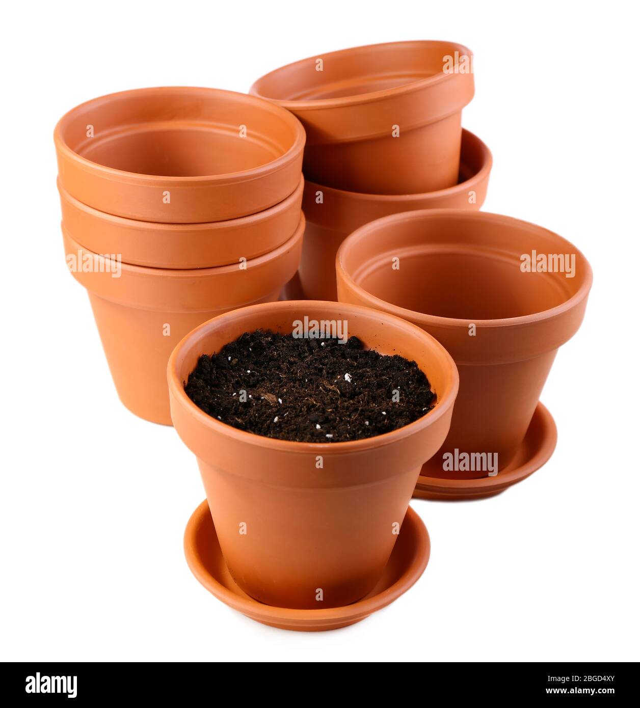 Clay flower pots and soil, isolated on white Stock Photo - Alamy
