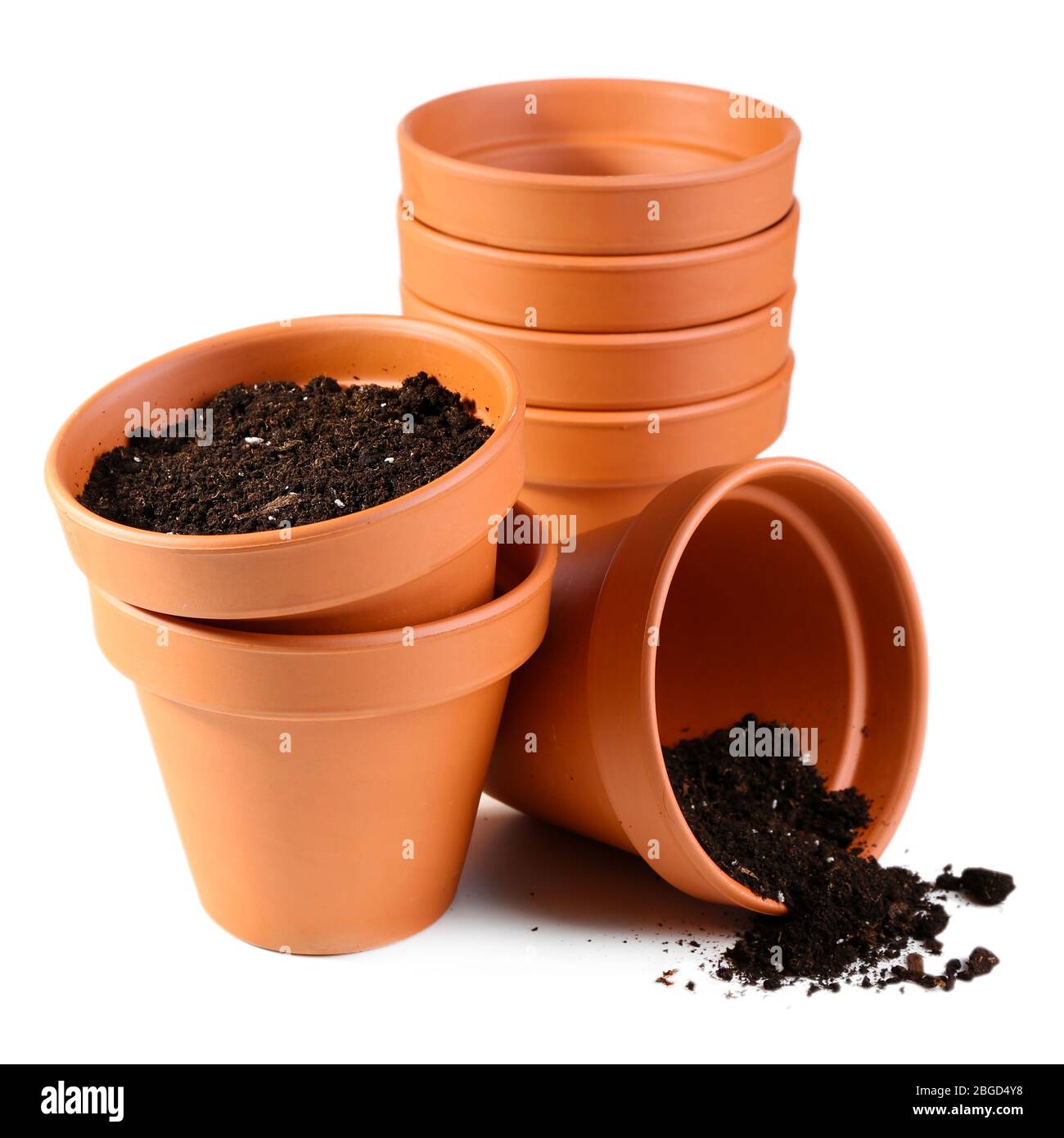 Clay flower pots and soil, isolated on white Stock Photo - Alamy