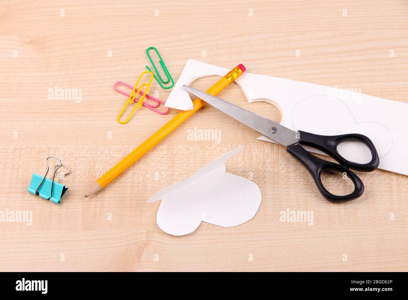 Arts and crafts felt with cutouts and scissors on white background Stock  Photo - Alamy