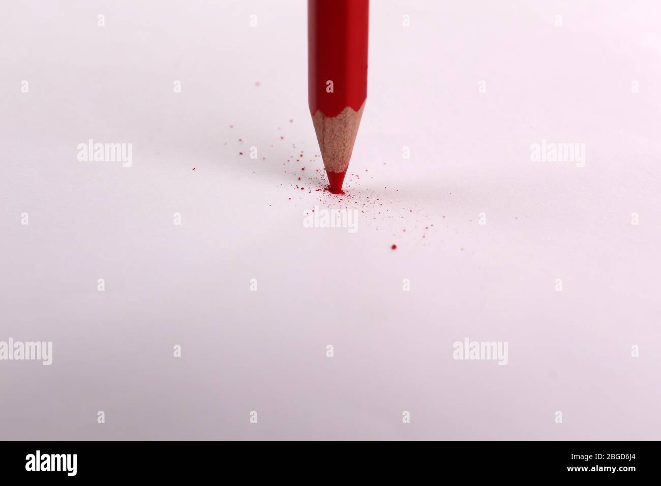 Breaking pencil on paper, close up Stock Photo Alamy