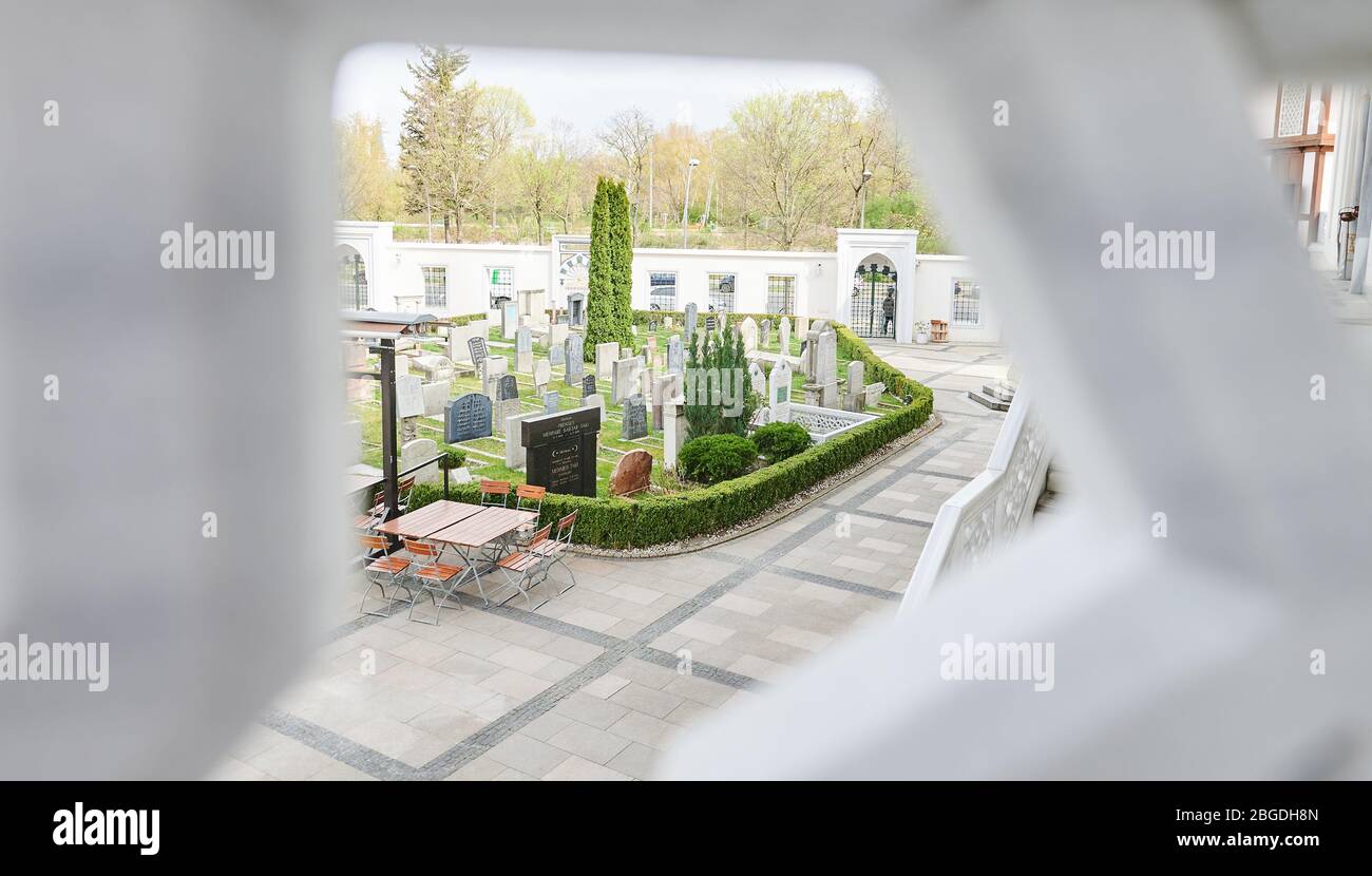 15 April 2020, Berlin: The historical cemetery of Sehitlic Mosque can be seen through the balcony of the mosque. The mosque got its name from the Turkish cemetery on the grounds. The historical cemetery has been in existence since 1866, when it was a diplomatic cemetery. Photo: Annette Riedl/dpa-Zentralbild/ZB Stock Photo