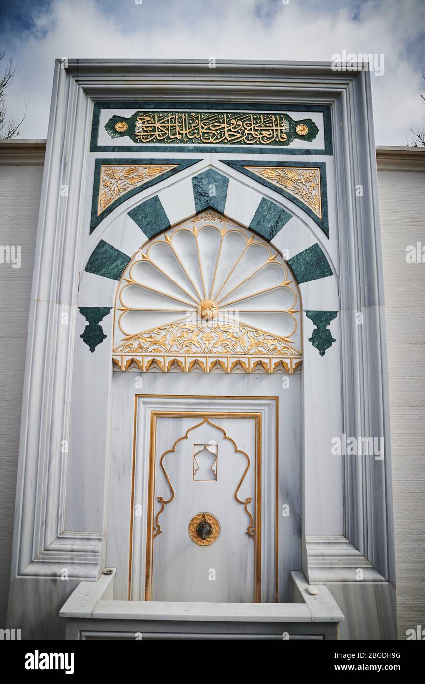 15 April 2020, Berlin: A fountain in the cemetery of the Sehitlic Mosque is decorated with golden-blue ornaments. The mosque got its name from the Turkish cemetery on the site. The historical cemetery has been in existence since 1866, when it was a diplomatic cemetery. Photo: Annette Riedl/dpa-Zentralbild/ZB Stock Photo