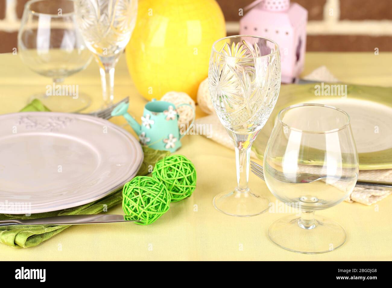 Beautiful spring table setting on bright background Stock Photo - Alamy