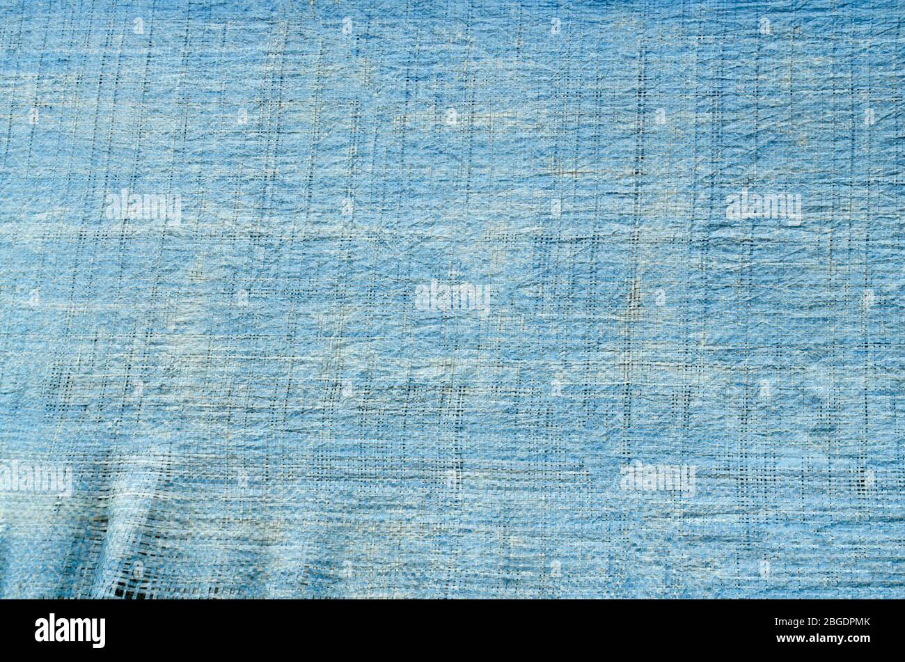 Close up blue dirty old plastic sacks texture. Stock Photo