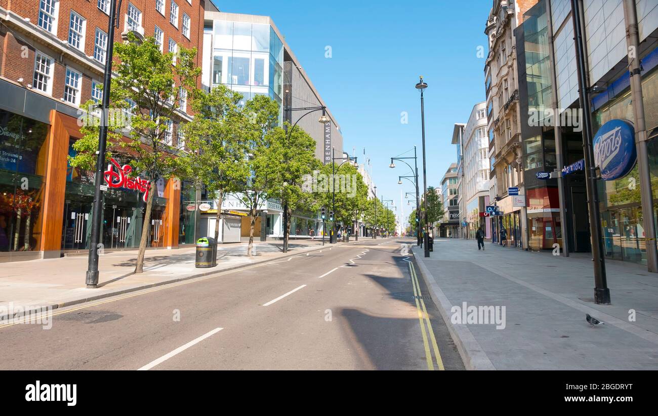 Coronavirus Pandemic a view  of Oxford Street in London  April 2020. No people only a few buses in the streets, all shops closed for Lockdown. Stock Photo