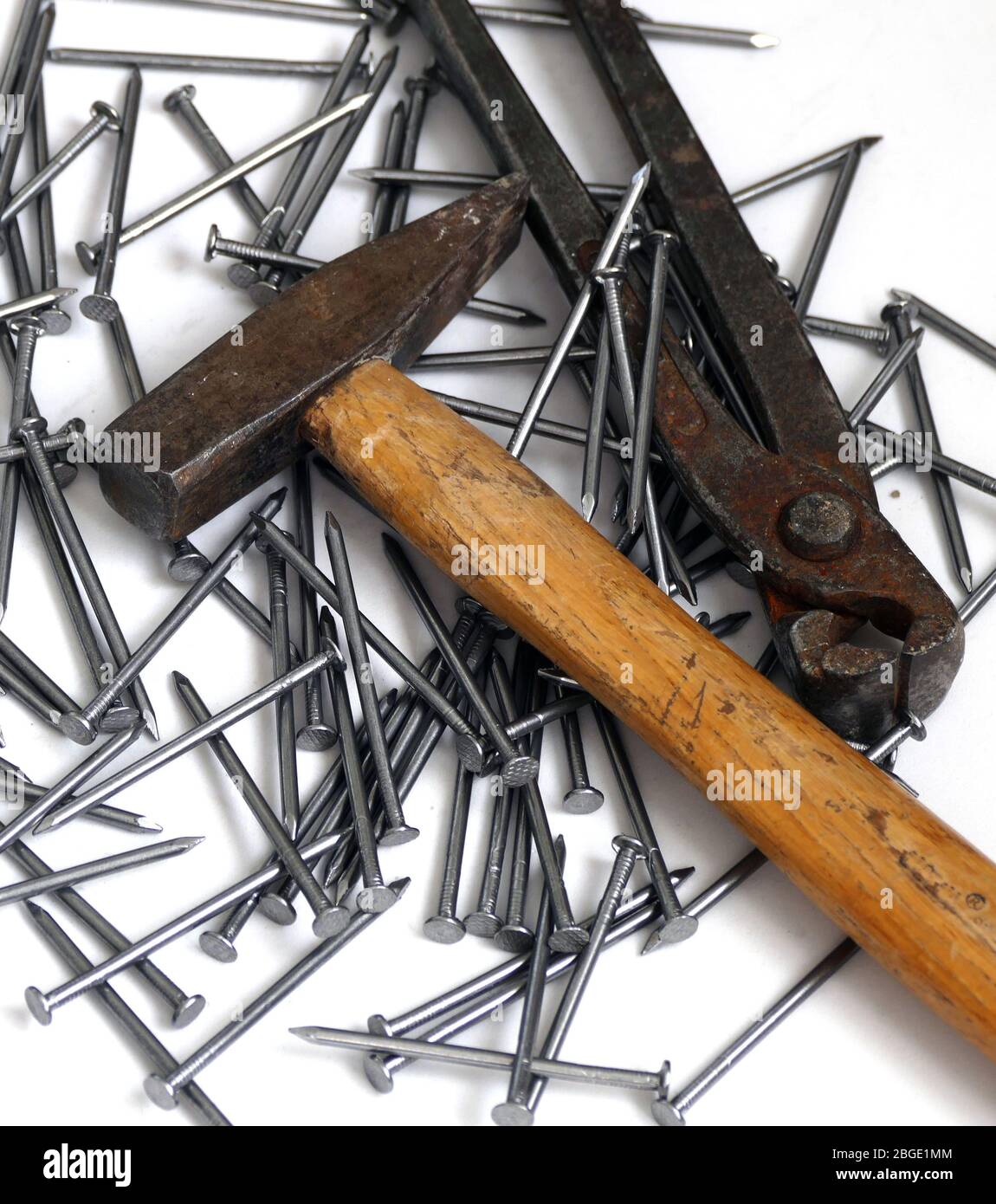 nails, hammer and pincers on a white background Stock Photo Alamy