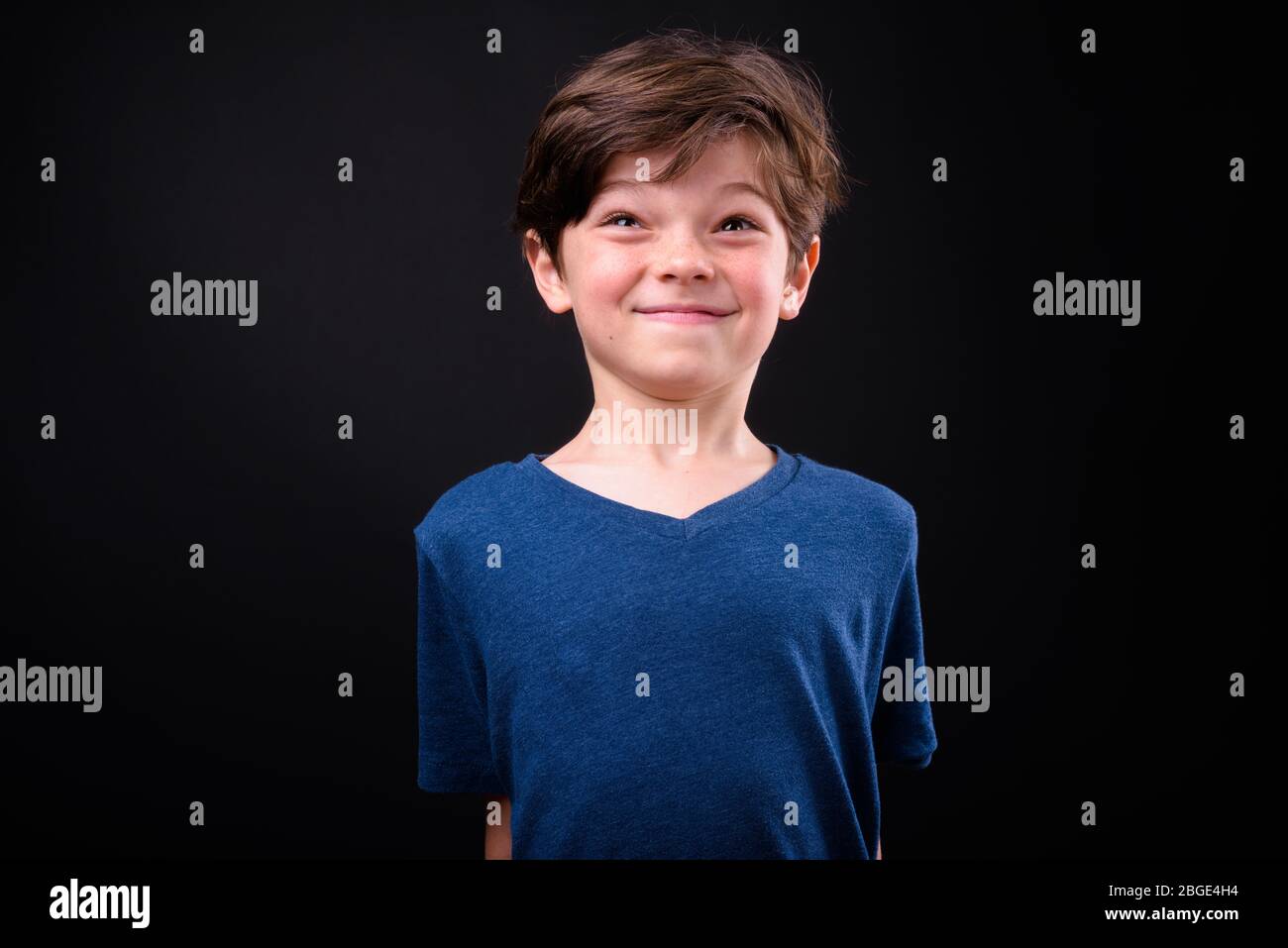 Portrait of happy young handsome boy making funny face Stock Photo