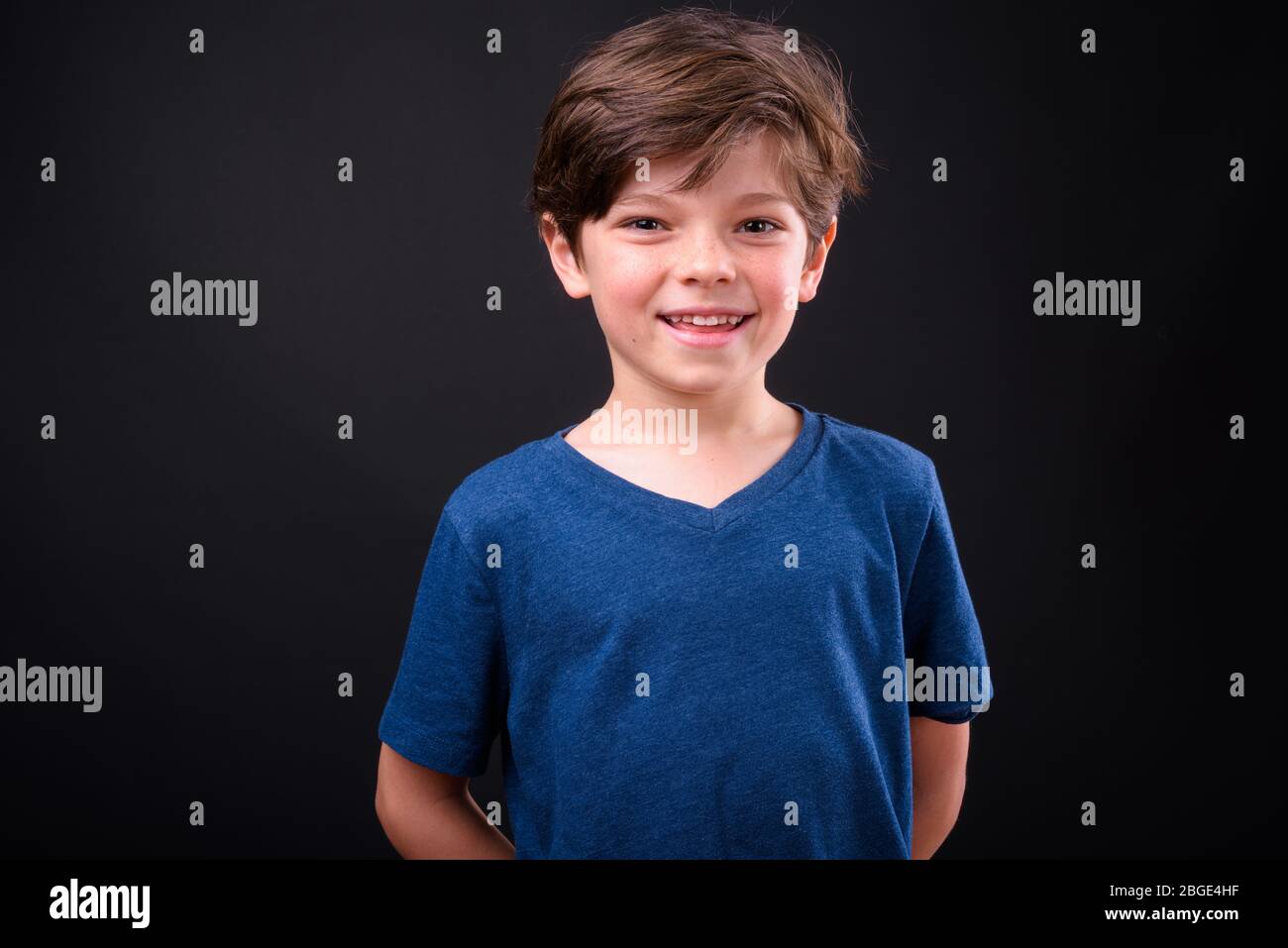 Portrait of happy young handsome boy smiling Stock Photo - Alamy