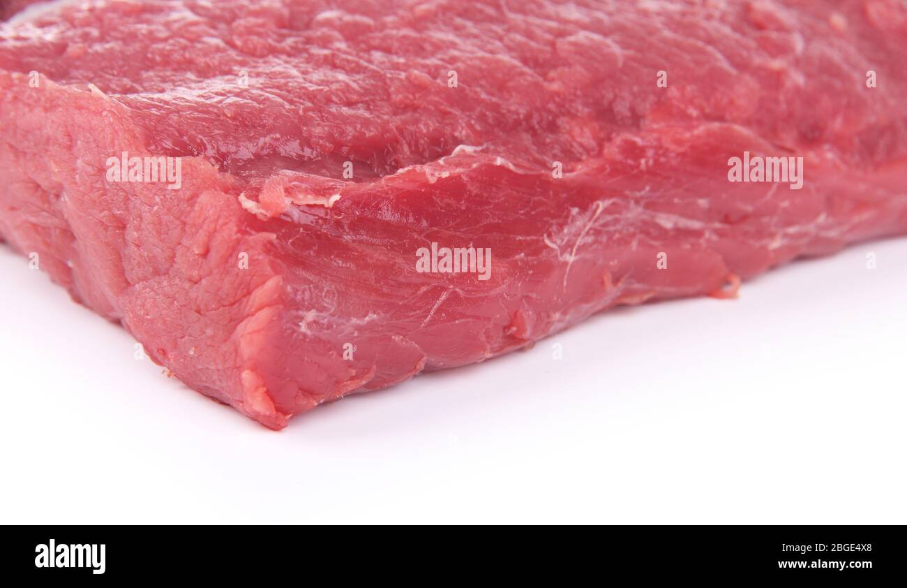 Raw beef meat isolated on white Stock Photo - Alamy