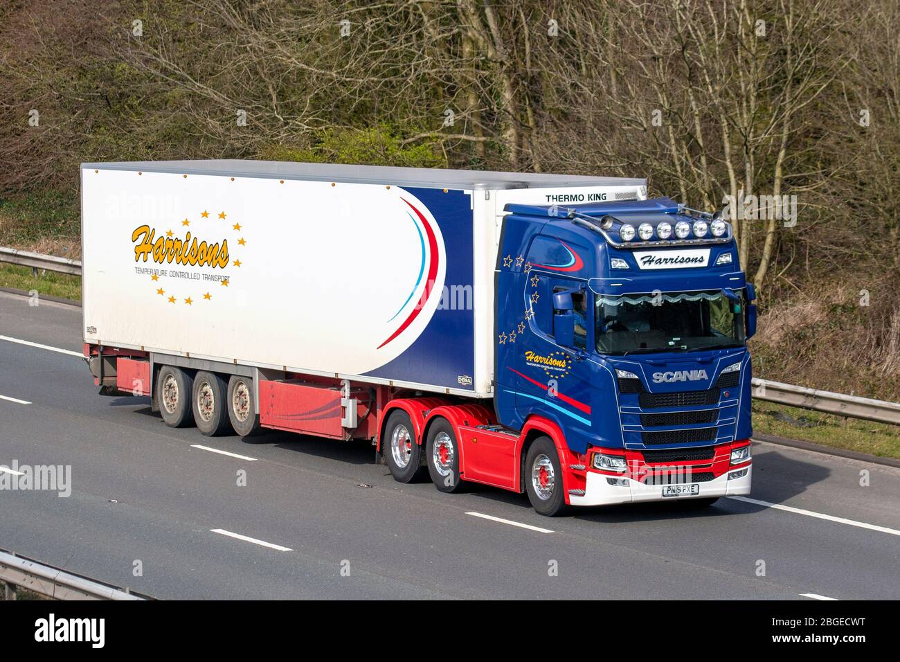 Harrisons Holdings Ltd Haulage delivery trucks, food lorry, Chilled transportation, truck, cargo carrier, Scania S450 vehicle, European commercial transport, industry, M61 at Manchester, UK Stock Photo