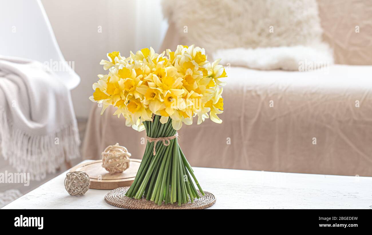 Composition with spring flowers in the interior. Stock Photo