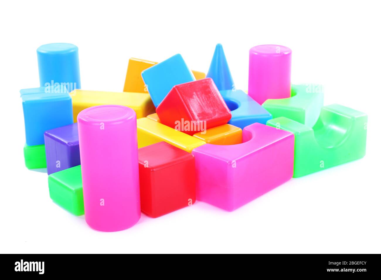 Colorful plastic toys isolated on white Stock Photo - Alamy