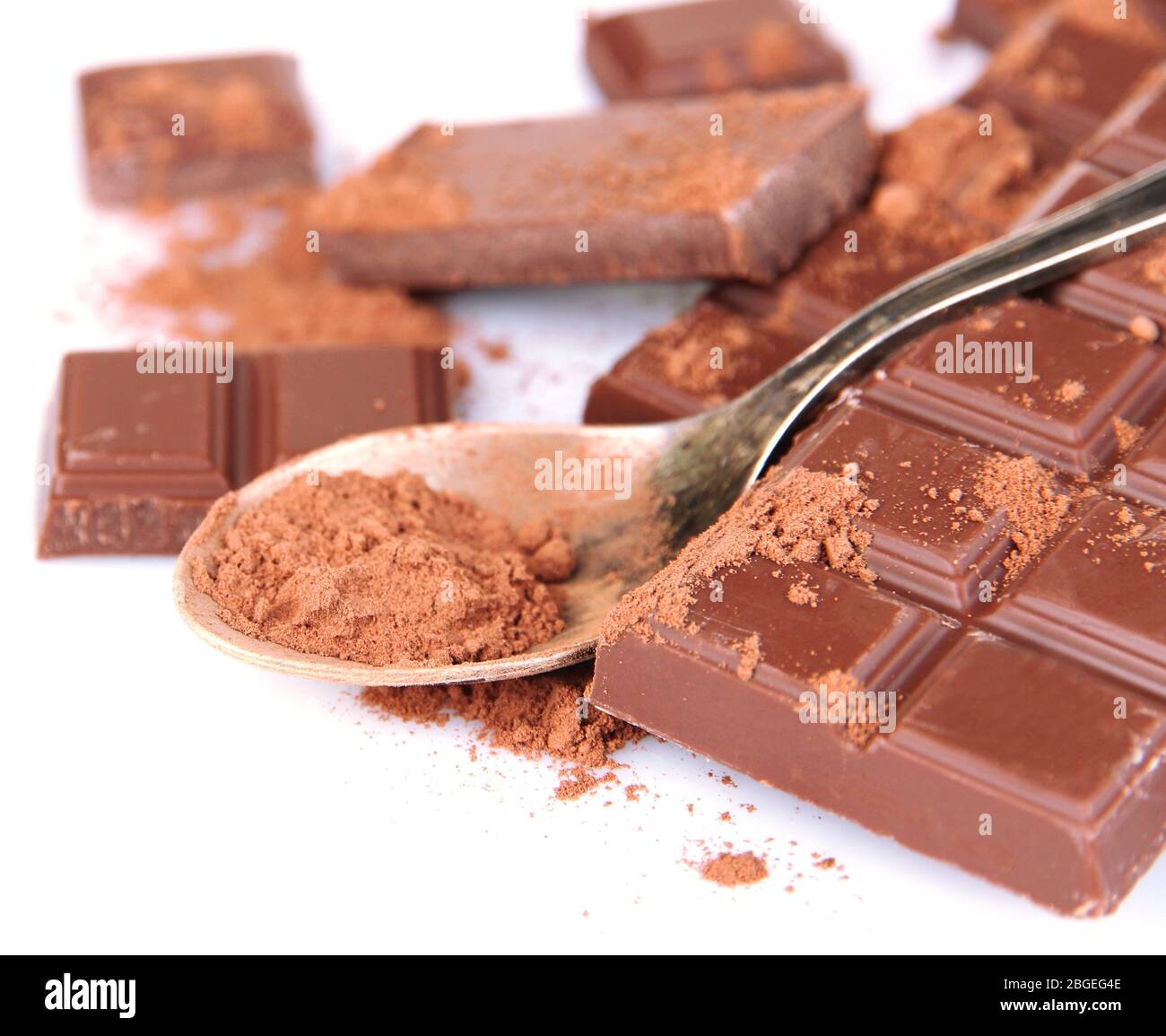 Cocoa powder and dark chocolate isolated on white Stock Photo Alamy