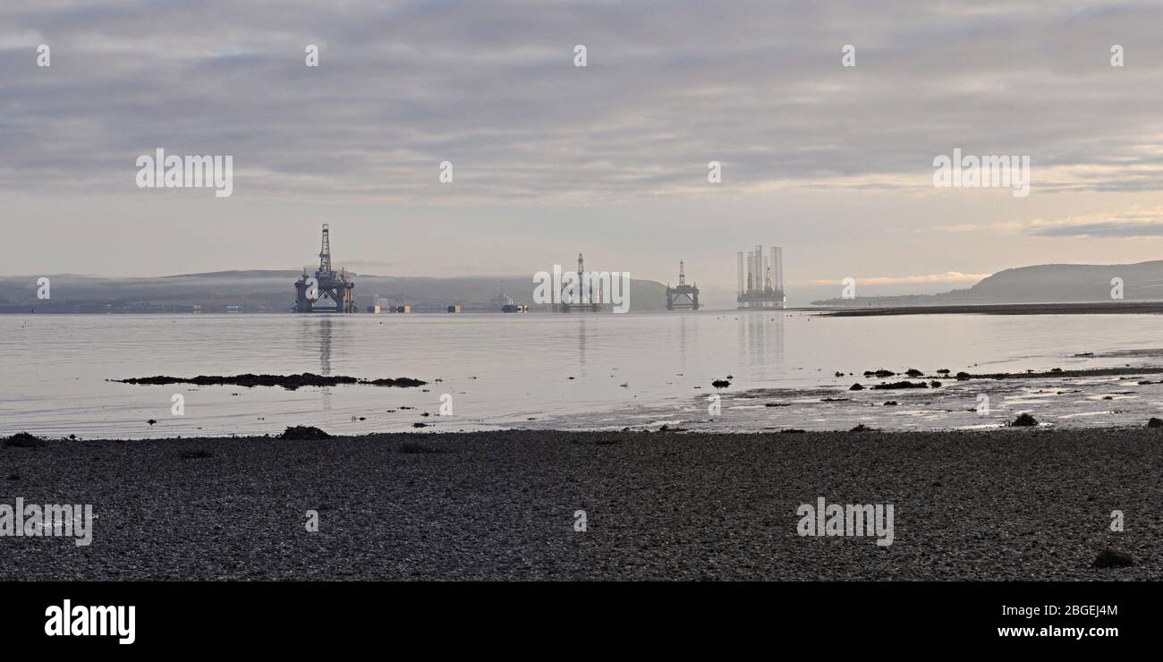 Oil rigs in the Cromarty Firth in Scotland viewed from Balblair Stock Photo