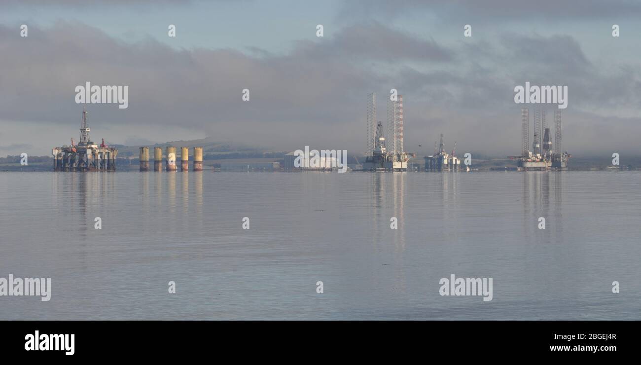 Oil rigs in the Cromarty Firth in Scotland viewed from Balblair Stock Photo