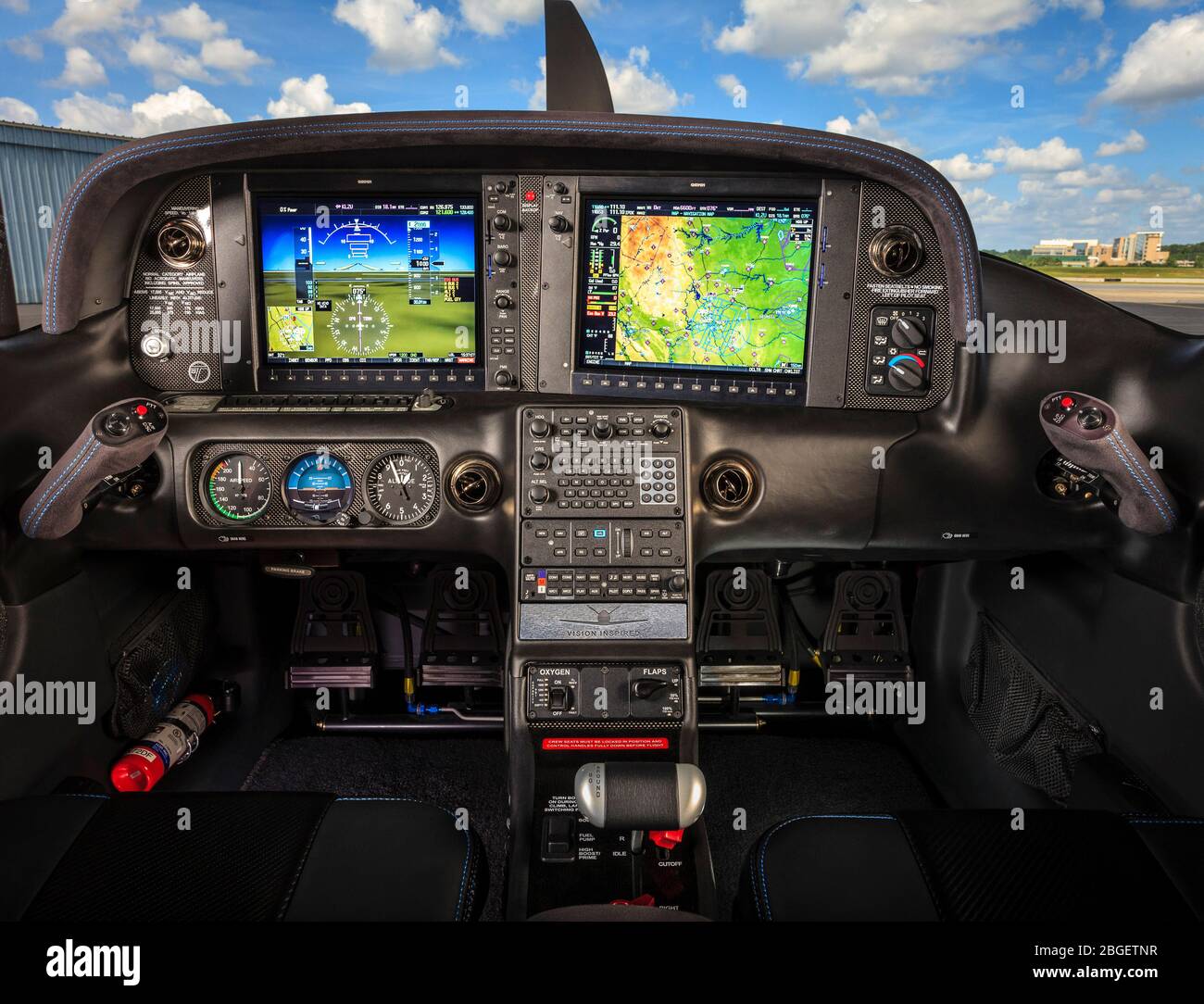Flat screen panel of a Cirrus Vision Inspired SR-22T, featuring Garmin instruments. Stock Photo