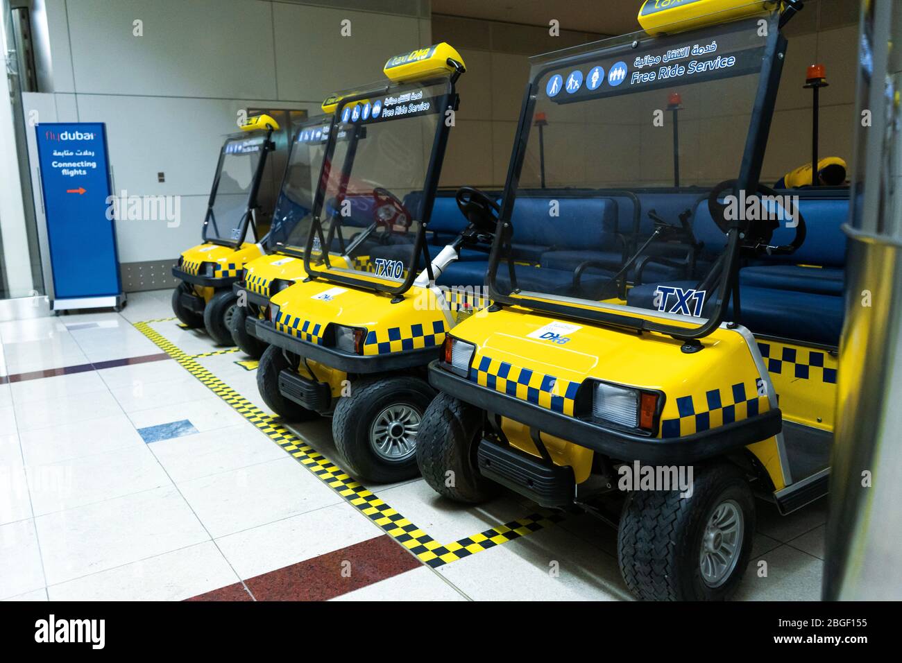 Electric Car Fleet Taxi In The Airport Terminal Taxi For Transporting electric-car-fleet-taxi-in-the-airport-terminal-taxi-for-transporting