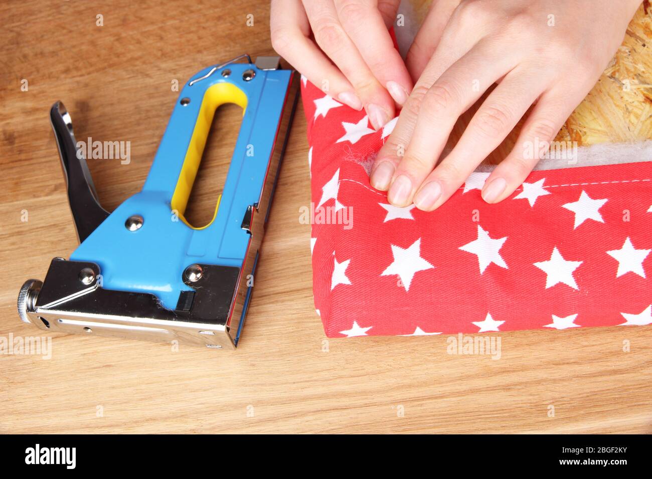 Female hand construction stapler hi-res stock photography and images ...