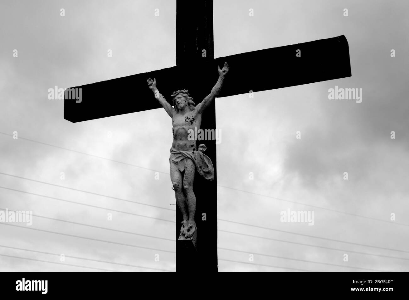Sculpture of jesus christ on the cross Black and White Stock Photos ...