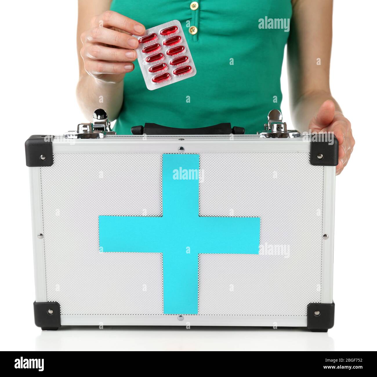 Woman holding first aid kit, isolated on white Stock Photo - Alamy